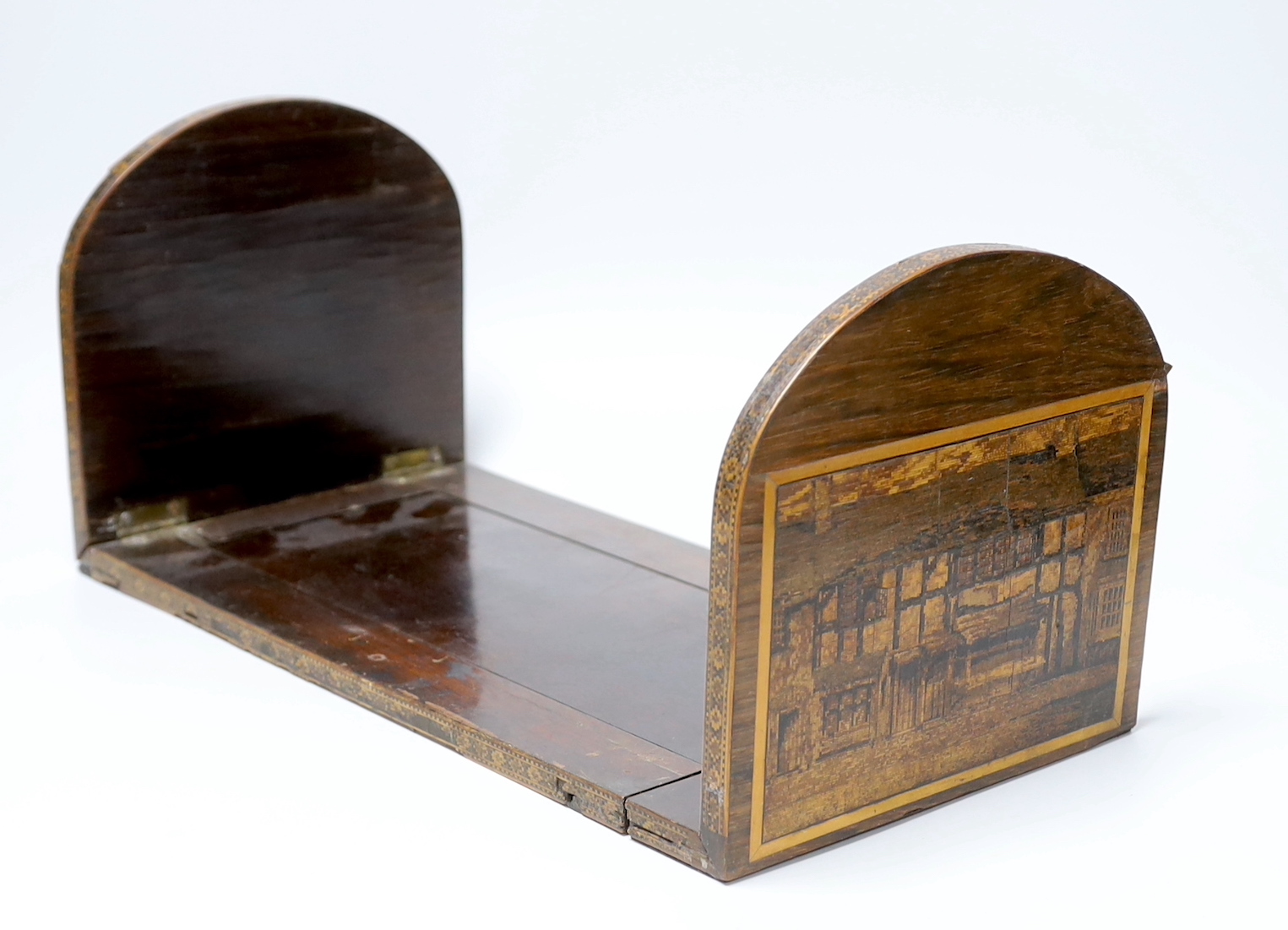 A 19th century Tunbridge ware rosewood tea caddy depicting Bayham Abbey ruins, and a bookslide with a rare view of the Pantiles and Shakespeare’s house, 39cm wide